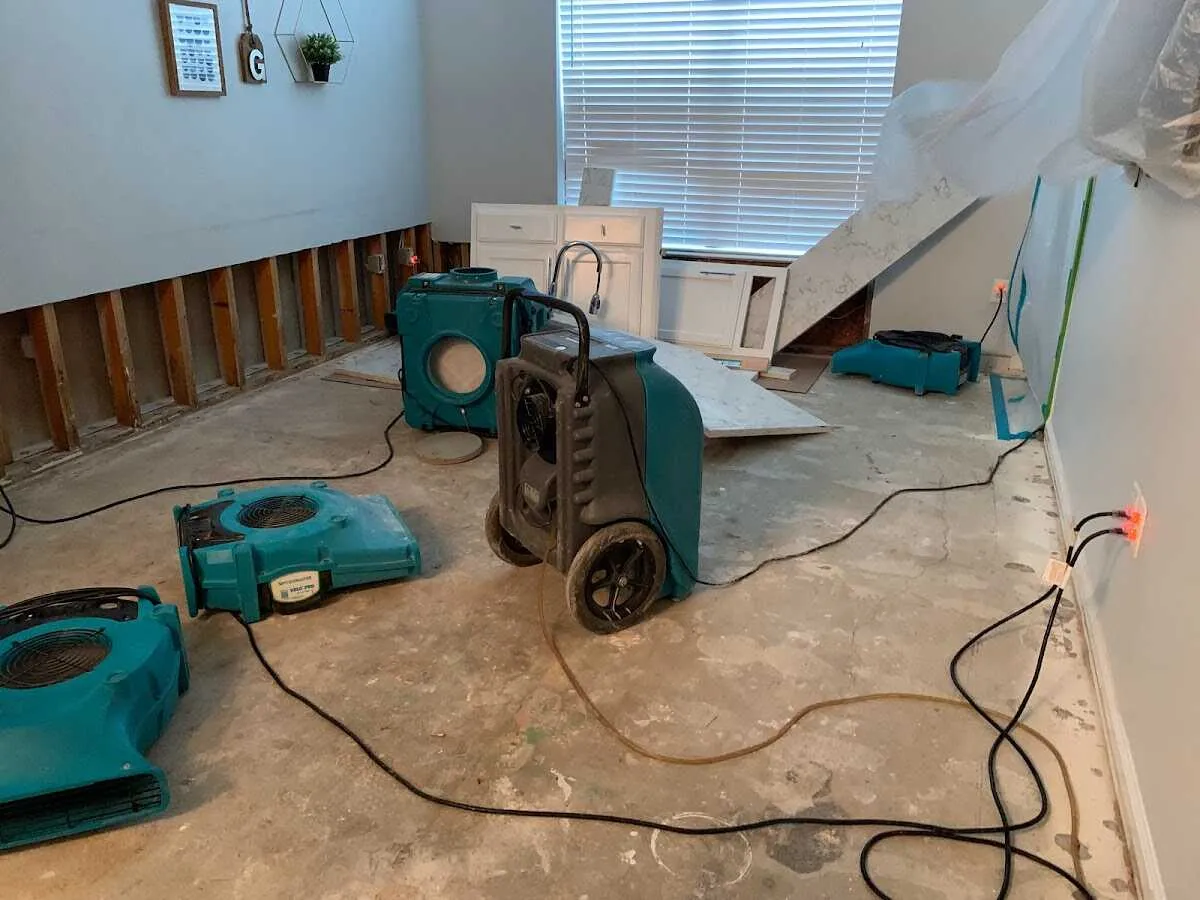 Dehumidifier in flood-cut room for Water Damage Restoration in Palmview